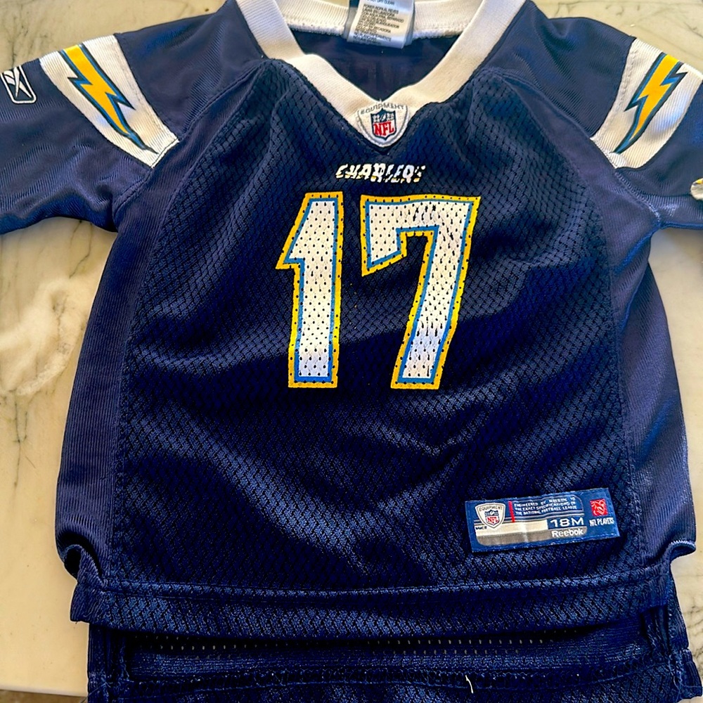 Chargers bundle with 18 month jersey and chargers onesie and hat size 0-3 month